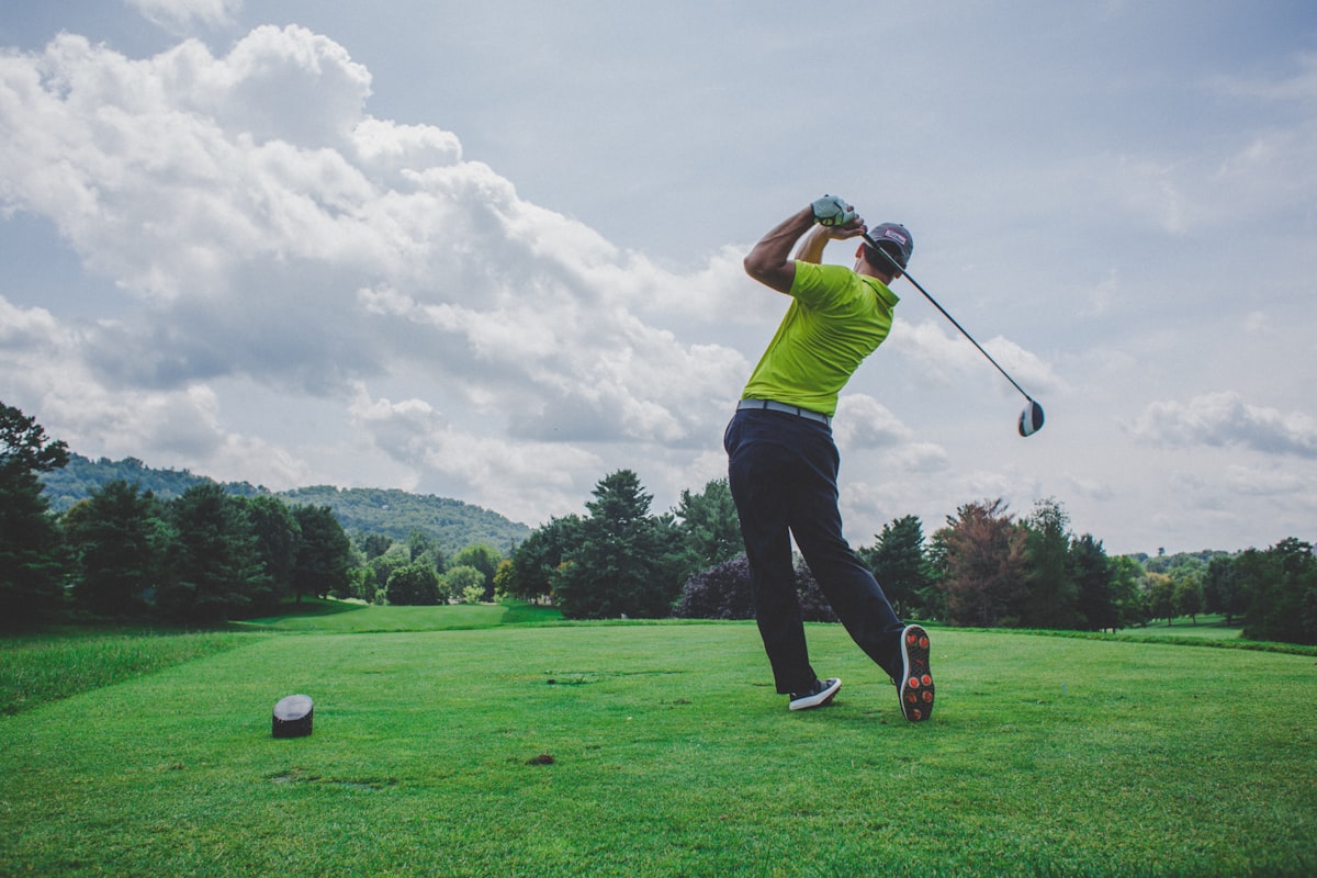 Championship golf course with mountain backdrop at The Country Club Of Colorado